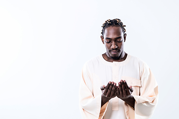 Image showing african man pray to Allah