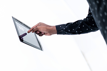 Image showing African man using smart home screen