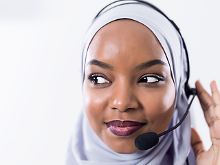 Image showing african customer representative business woman with phone headse