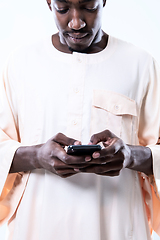 Image showing african man using smartphone