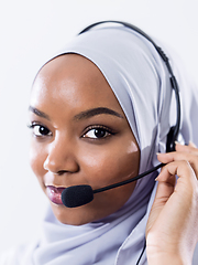 Image showing african customer representative business woman with phone headse