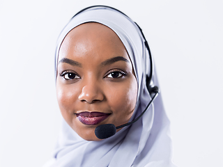 Image showing african customer representative business woman with phone headse