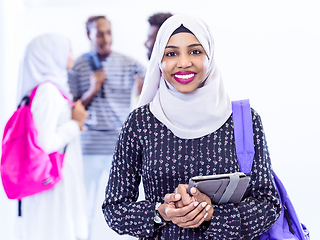 Image showing muslim female student with group of friends