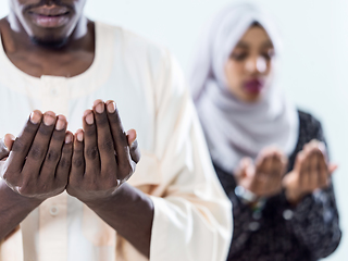 Image showing african muslim couple praying