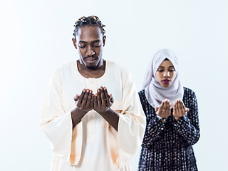 Image showing african muslim couple praying