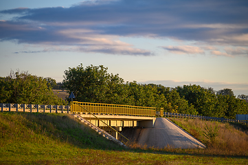 Image showing Road bridge in sunset rays