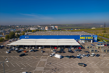 Image showing Metro retail store, large shopping mall of household and food goods with parking, aerial view, copyspace