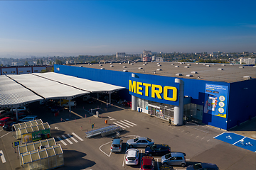 Image showing Metro retail store, large shopping mall of household and food goods with parking, aerial view, copyspace