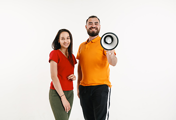 Image showing Young men weared in LGBT flag colors isolated on white background, LGBT pride concept