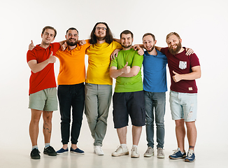 Image showing Young men weared in LGBT flag colors isolated on white background, LGBT pride concept