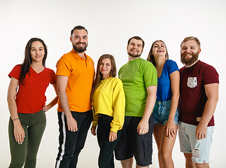 Image showing Young people weared in LGBT flag colors isolated on white background, LGBT pride concept