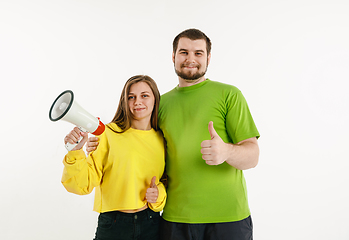 Image showing Young men weared in LGBT flag colors isolated on white background, LGBT pride concept