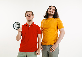 Image showing Young men weared in LGBT flag colors isolated on white background, LGBT pride concept