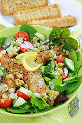 Image showing Green salad with chicken stripes