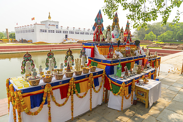 Image showing Buddha birthplace in Lumbini and buddhist offerings