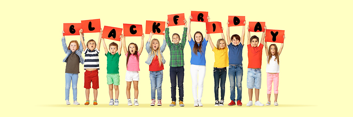 Image showing Black friday, sales concept - childrens with the tables and letters