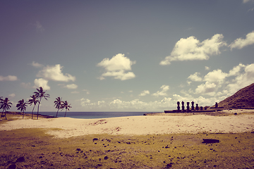 Image showing Anakena palm beach and Moais statues site ahu Nao Nao, easter is