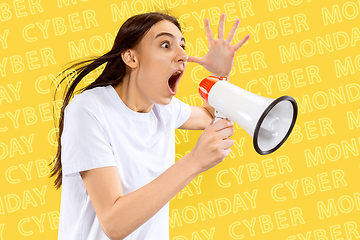 Image showing Portrait of young woman on yellow background, black friday