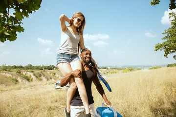 Image showing Young multiethnic international couple outdoors