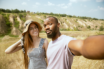 Image showing Young multiethnic international couple outdoors