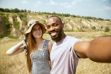 Image showing Young multiethnic international couple outdoors