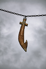 Image showing Sword hanging on a chain