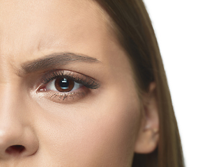 Image showing Close up portrait of beautiful young woman face on white studio background