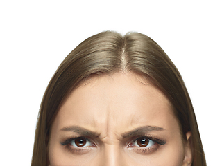 Image showing Close up portrait of beautiful young woman face on white studio background