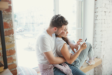 Image showing Young couple moved to a new house or apartment