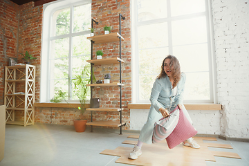 Image showing Young couple moved to a new house or apartment