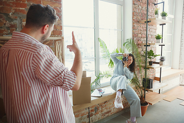 Image showing Young couple moved to a new house or apartment