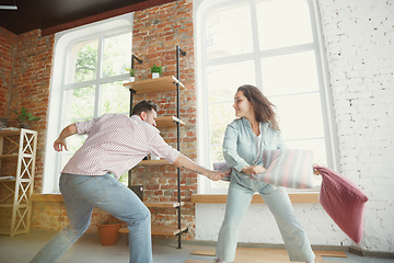 Image showing Young couple moved to a new house or apartment