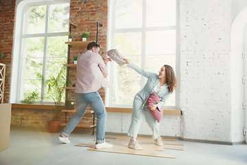 Image showing Young couple moved to a new house or apartment