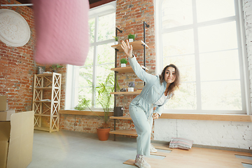 Image showing Young couple moved to a new house or apartment