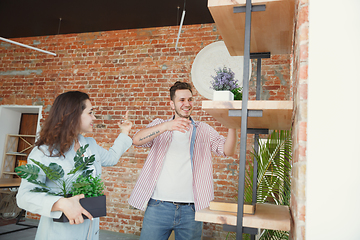 Image showing Young couple moved to a new house or apartment