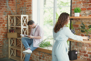 Image showing Young couple moved to a new house or apartment