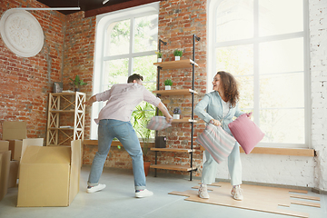 Image showing Young couple moved to a new house or apartment