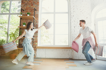 Image showing Young couple moved to a new house or apartment