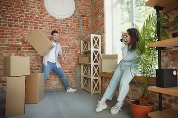 Image showing Young couple moved to a new house or apartment
