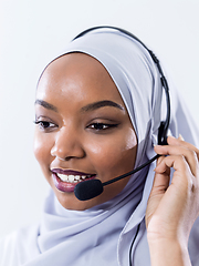 Image showing african customer representative business woman with phone headse