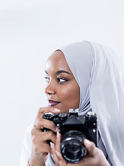 Image showing african modern muslim woman using retro camera