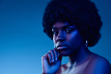 Image showing Portrait of female high fashion model in neon light