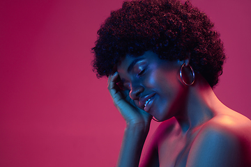 Image showing Portrait of female high fashion model in neon light