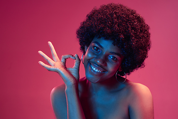 Image showing Portrait of female high fashion model in neon light