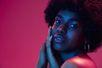 Image showing Portrait of female high fashion model in neon light