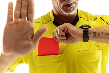 Image showing Football referee showing a red card to a displeased player isolated on white background