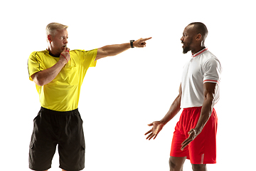 Image showing Football referee gives directions with gestures to players isolated on white background