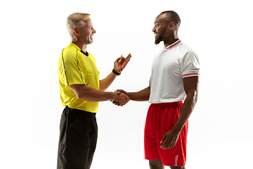 Image showing Football referee gives directions with gestures to players isolated on white background