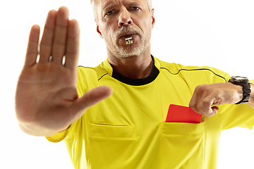 Image showing Football referee showing a red card to a displeased player isolated on white background