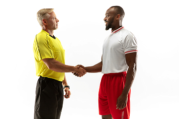 Image showing Football referee gives directions with gestures to players isolated on white background